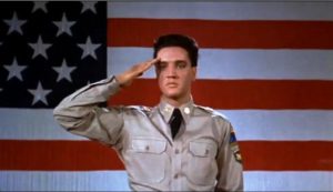 Elvis Saluting in front of US Flag