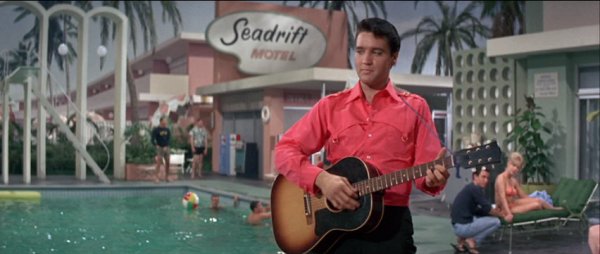 Elvis playing guitar during Girl Happy