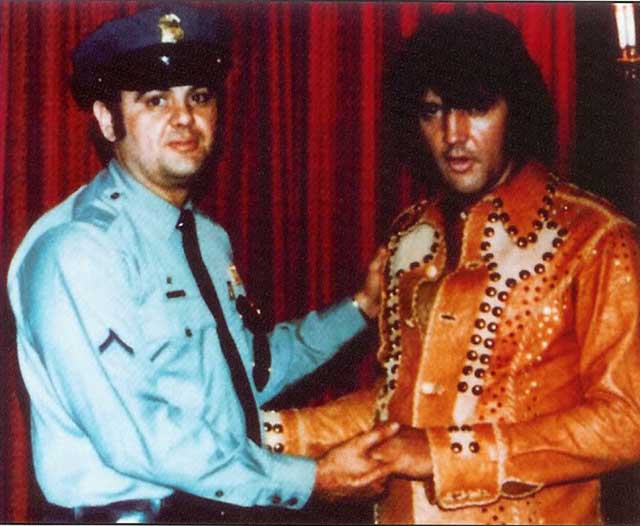 Elvis Shakes Hand With Cop